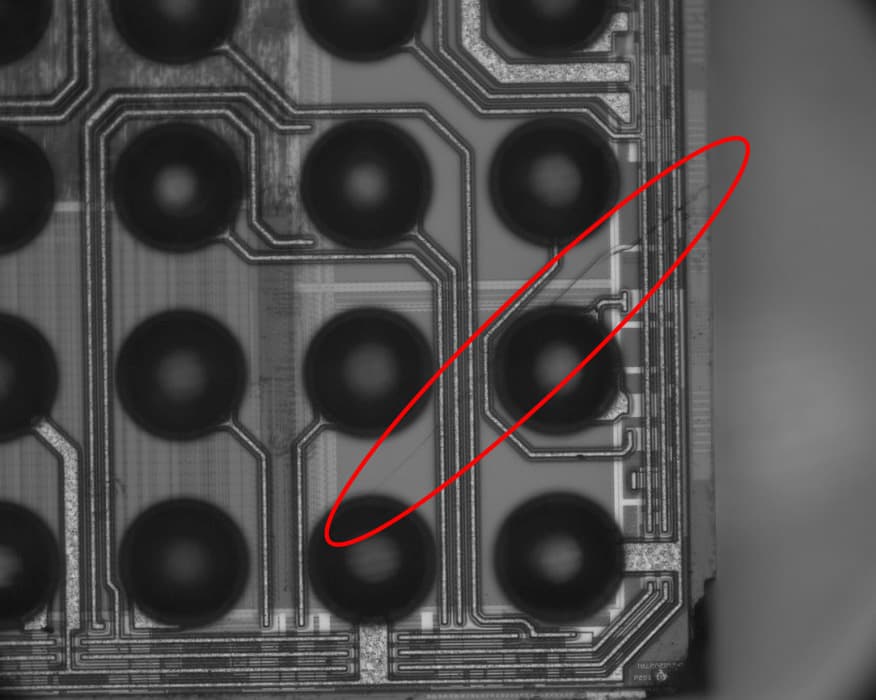 SWIR microscope image showing internal semiconductor structures through silicon