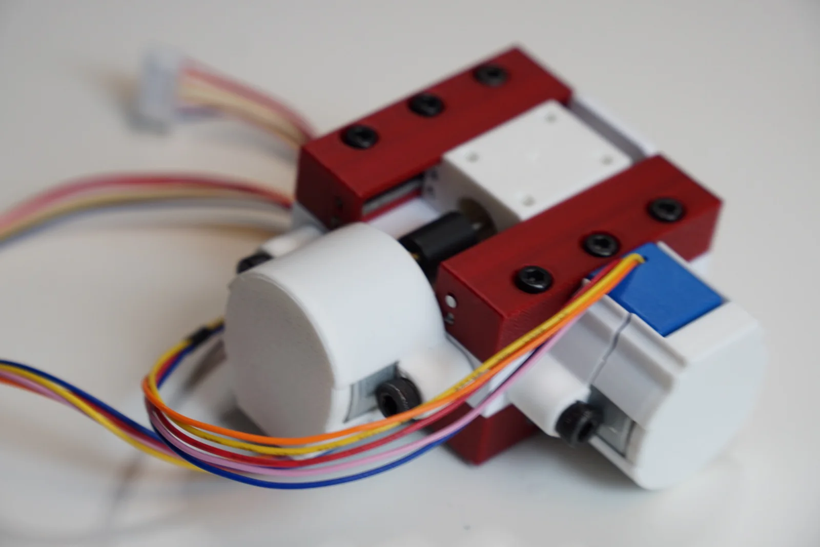 Experimental V8 XY stage built from printed parts and two 28BYJ-48 stepper motors