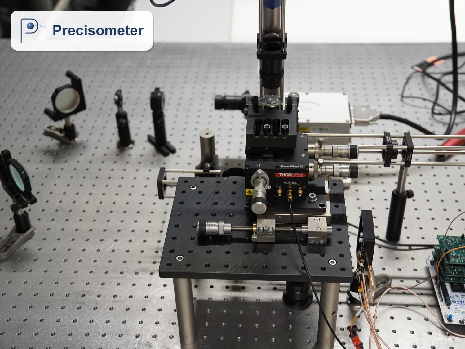 MicroRheo optical tweezers microrheology setup on an optical table